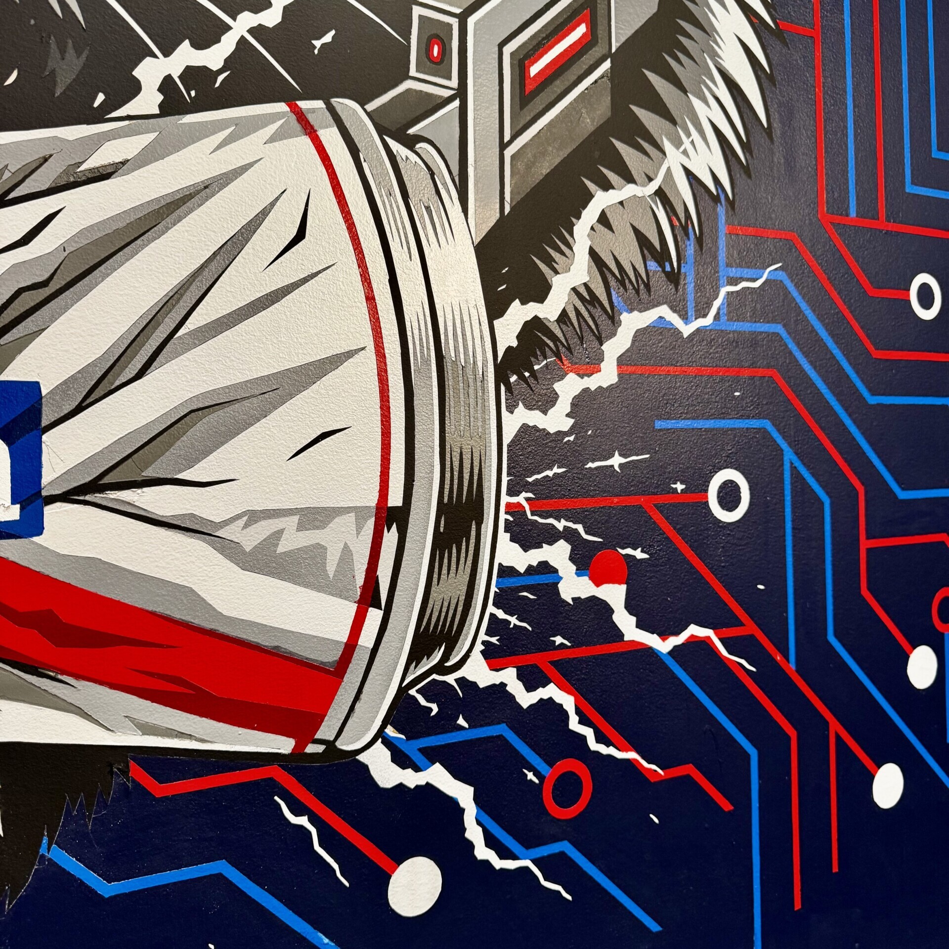 A closeup of the mural's can